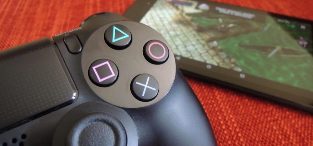 How can you link a PlayStation 4 controller to an Android phone